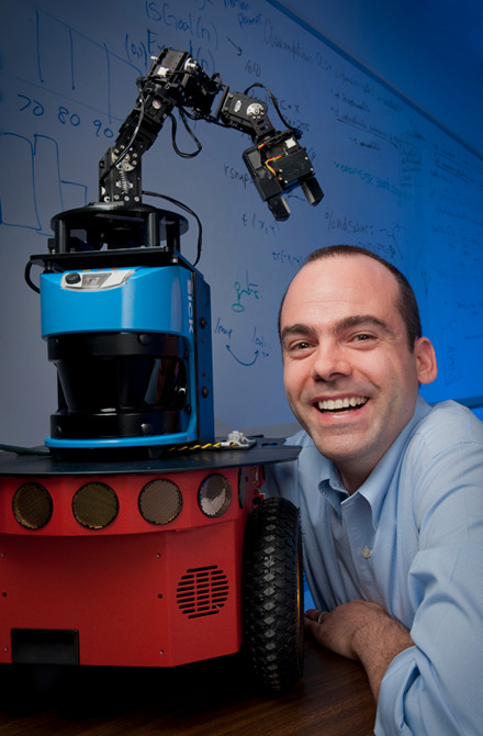 Picture of Wheeler Ruml and a robot, taken October 2012